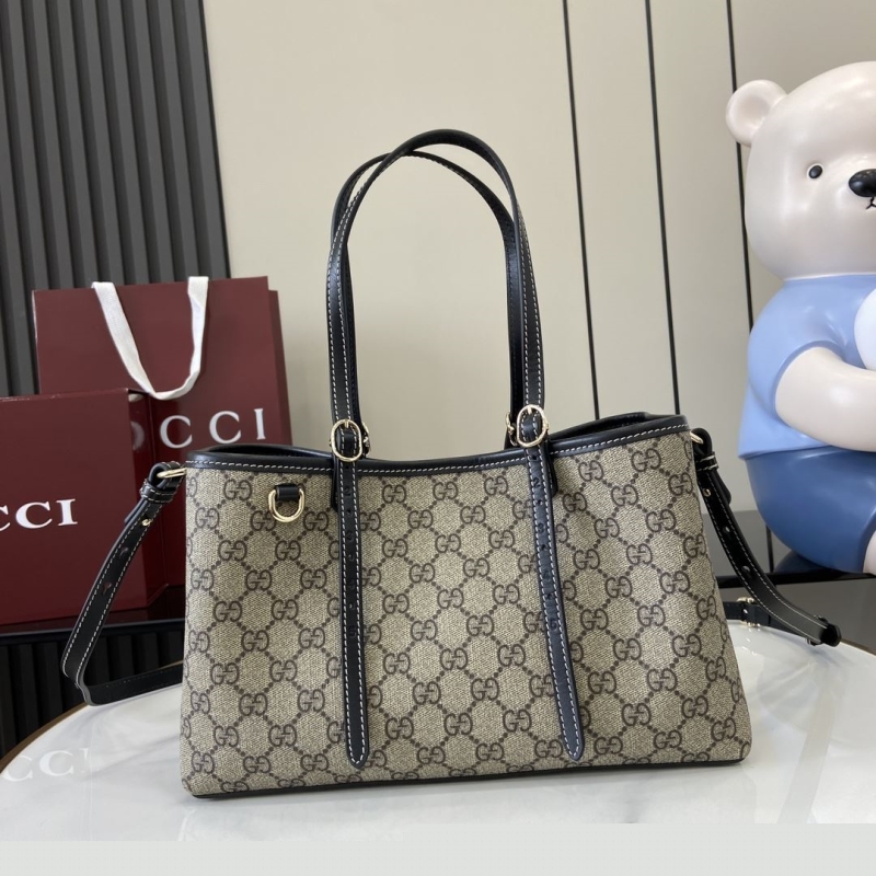 G*u*i shopping bags